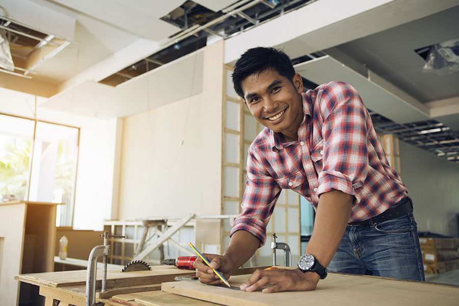 Business Insurance - Smiling Construction Business Owner Portrait